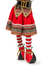 Back of the red elf costume showing the skirt and striped stockings