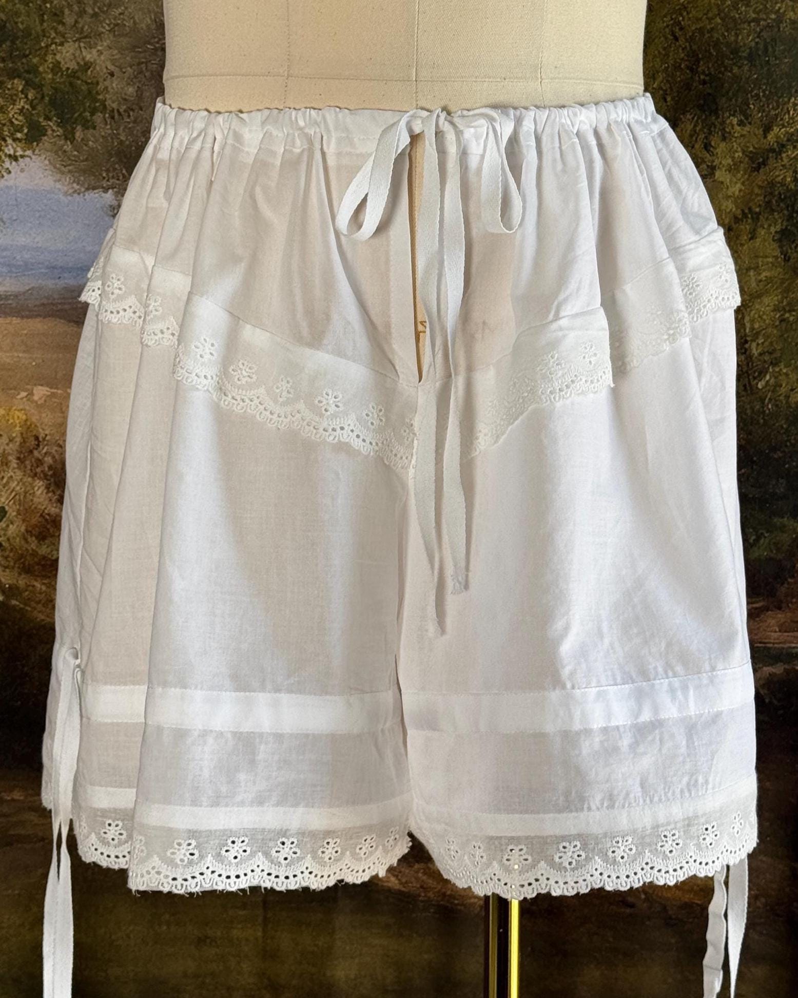 Front of the bloomers showing the lace trim and waist tie