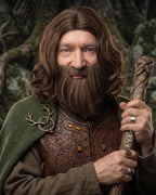 Brown beard and wig worn with a green cloak and leather harness