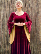Burgundy velvet dress with wide bell sleeves and gold lining