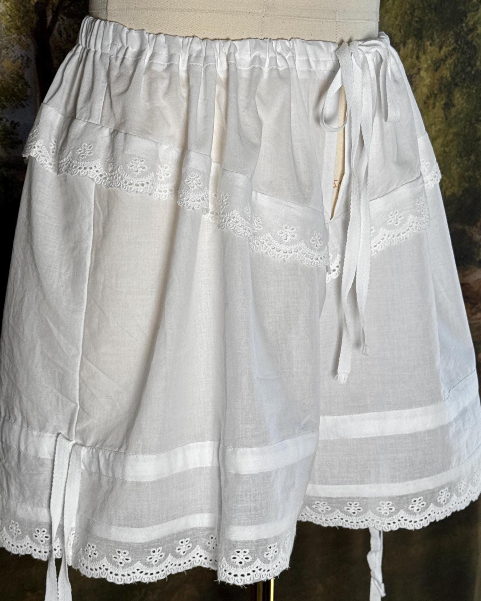 Bloomers with the ruffled legs shortened by the side bows