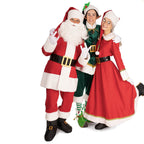 Mrs. Claus with Santa and a green elf in matching costumes