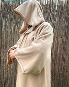 Beige fleece hooded robe seen from the side