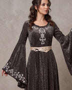 Bell sleeve of the sage velvet gown with silver ornamental trim